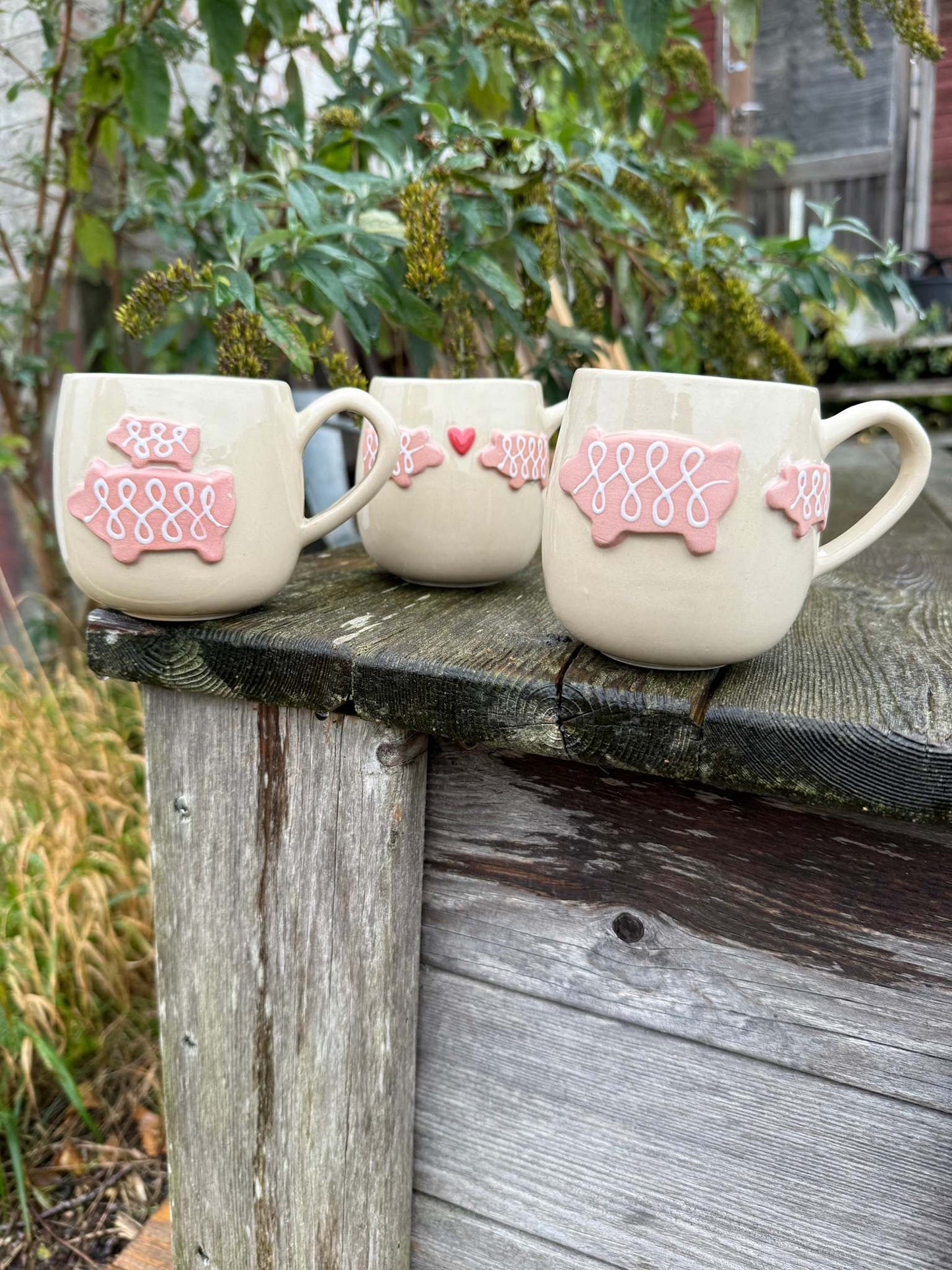 Kagegris kop - hjerte med venstrevendt hank